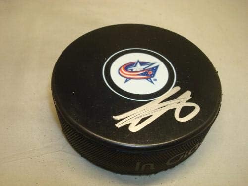 Хокейна шайба, с автограф Сони Милано Кълъмбъс Блу Джакетс 1A - за Миене на НХЛ с автограф